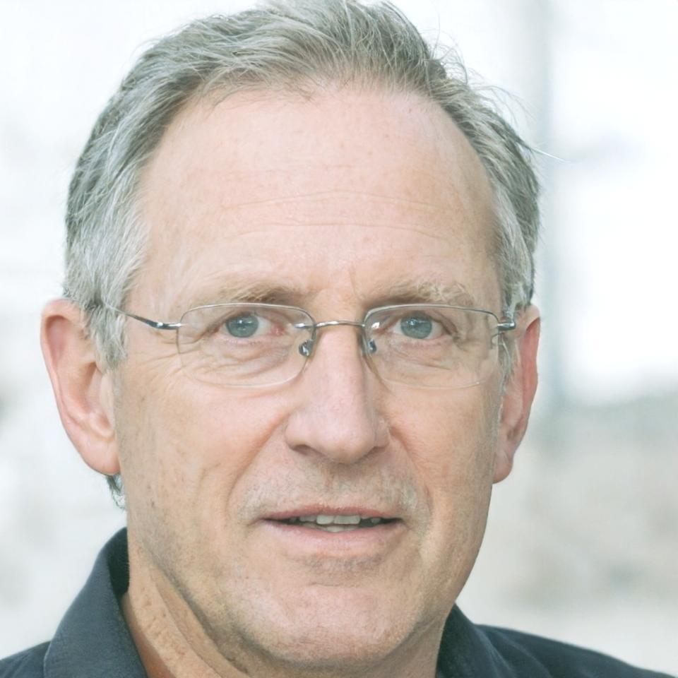 Video editing instructor reviewing timeline